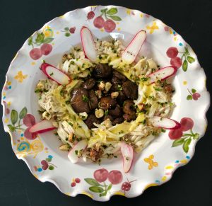 Salade tiède d'aile de raie, shiitaké et noisettes